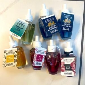 (2) Wallflower plug-ins and (7) Wallflower refills from Bath & Body Works. NWT.